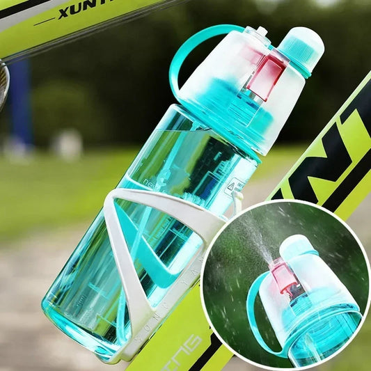 Creative Spray Water Bottle – Portable atomizing sports drinkware in use by active individuals outdoors.